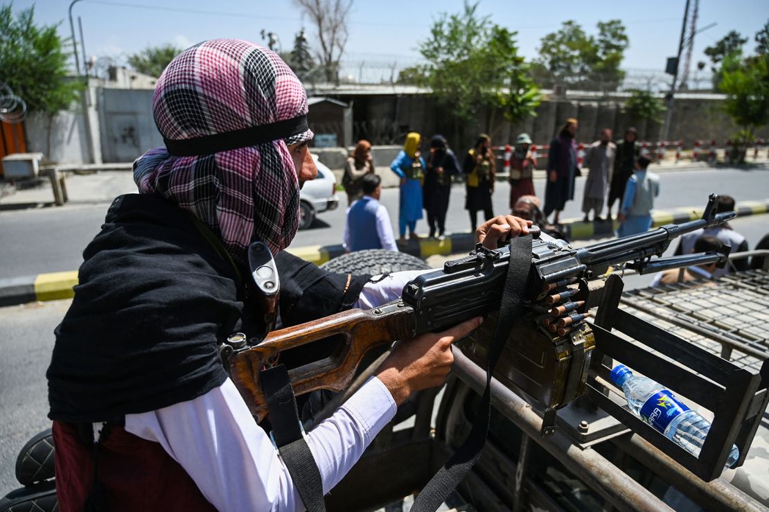 Taliban fighters patrol a street in Kabul on August 16, 2021.