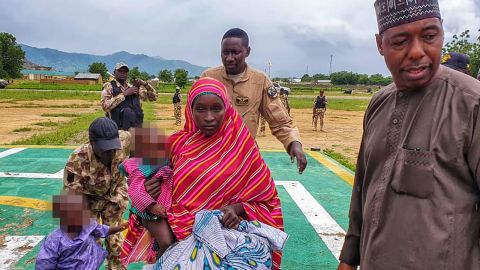 The army handed over Hassana Adamu, along with her two children, to Governor Babagana Zulum on Saturday, one week after his office announced that another of the victims had been freed and reunited with her parents. 
Note: Portions of this photo have been obscured by CNN because of the age of the subjects. 