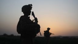 Silhouettes of US Marines are seen in 2009 in Herati, Afghanistan.