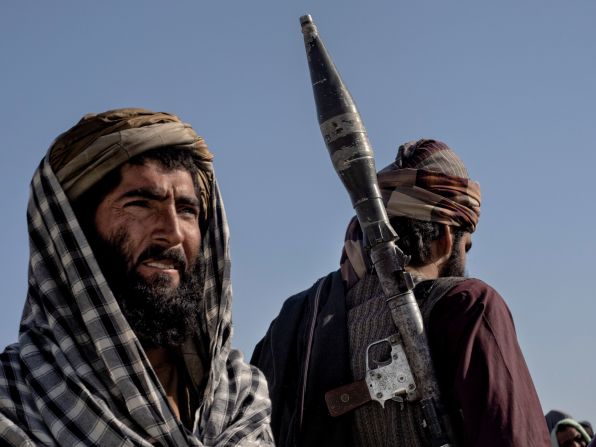Taliban fighters are seen in Kandahar, Afghanistan, on August 14. The Taliban had seized Kandahar, the country's second-largest city, and a number of other provincial capitals. Kandahar, which lies in the south of the country, had been besieged by the Taliban for weeks. Many observers <a href="index.php?page=&url=https%3A%2F%2Fwww.cnn.com%2Fworld%2Flive-news%2Fafghanistan-taliban-us-troops-intl-08-13-21%2Findex.html" target="_blank">considered its fall as the beginning of the end</a> for the country's government.