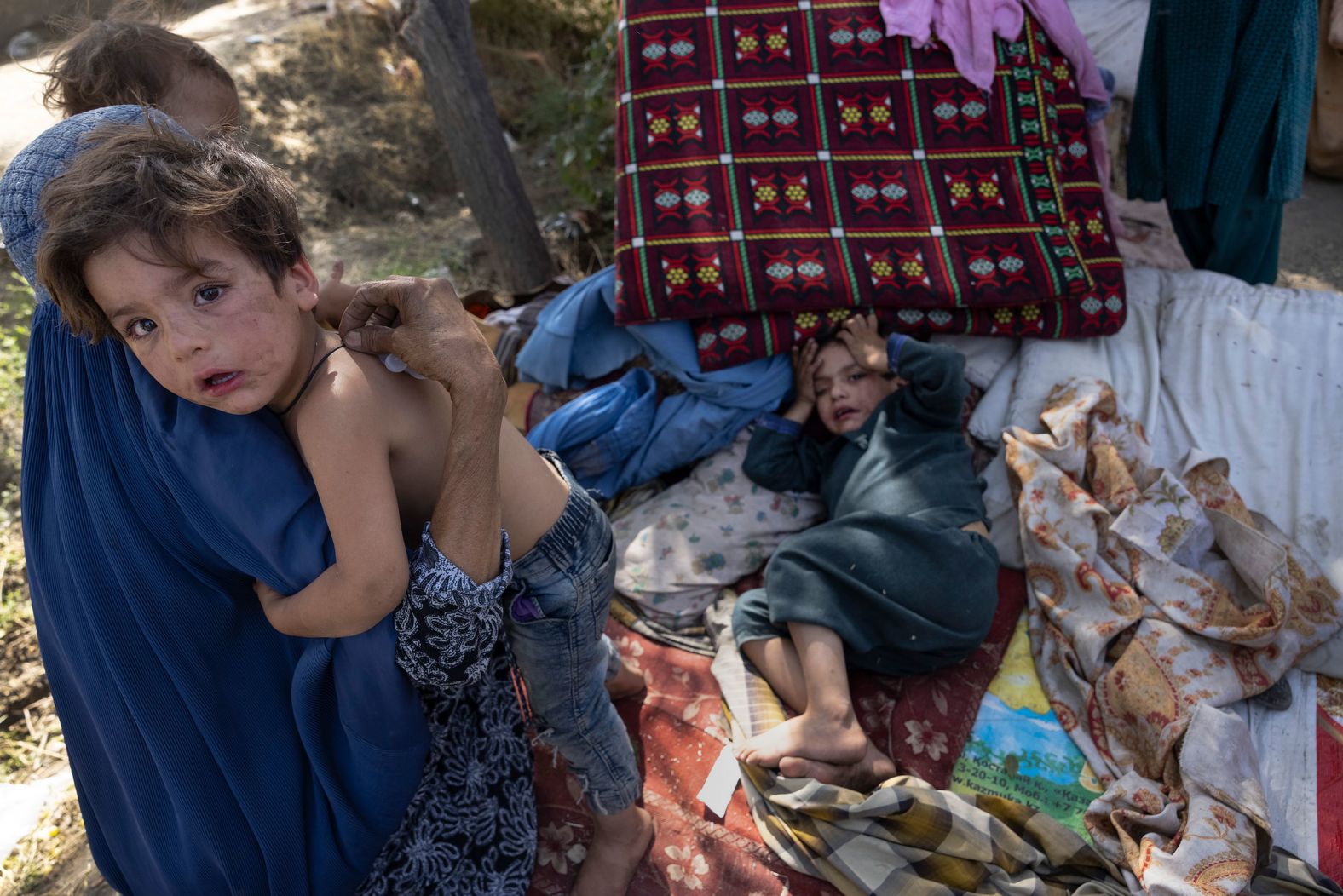 Displaced Afghans from the country's northern provinces arrive at a makeshift camp in Kabul on August 10. Provincial capitals in the north were among the first to fall to the Taliban.