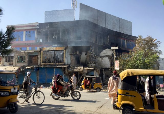 Shops in Kunduz, Afghanistan, are damaged after fighting between Taliban militants and Afghan military forces on August 8. Kunduz was <a href="index.php?page=&url=https%3A%2F%2Fwww.cnn.com%2F2021%2F08%2F08%2Fasia%2Fafghanistan-taliban-kunduz-intl%2Findex.html" target="_blank">the first major city to fall to the Taliban</a> since they began their offensive in May.