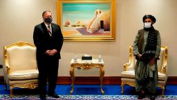 US Secretary of State Mike Pompeo (L) meets with Taliban co-founder Mullah Abdul Ghani Baradar in the Qatari capital Doha on November 21, 2020, amid signs of progress in their talks as Washington speeds up its withdrawal. - Pompeo's visit comes in the wake of a rocket attack which struck densely populated areas of Kabul, killing at least eight people in the latest outbreak of violence in the Afghan capital. The Taliban have denied responsibility while the Islamic State group claimed the deadly strike. (Photo by Patrick Semansky / POOL / AFP) (Photo by PATRICK SEMANSKY/POOL/AFP via Getty Images)