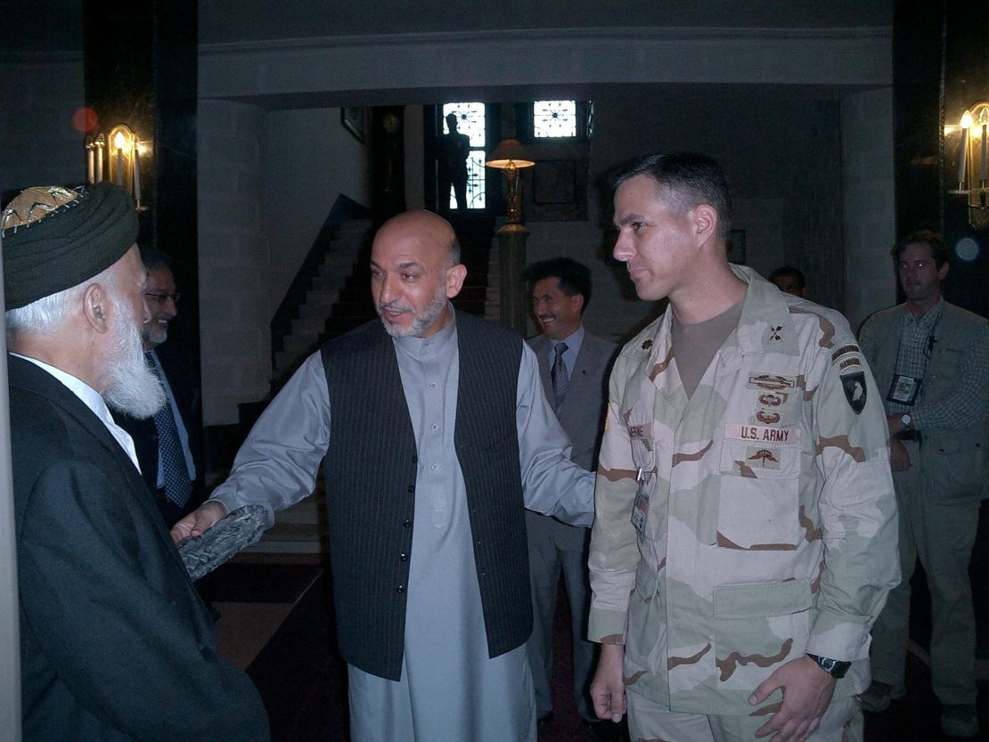 Amerine with Karzai and former Afghan President Burhanuddin Rabbani in 2004. 