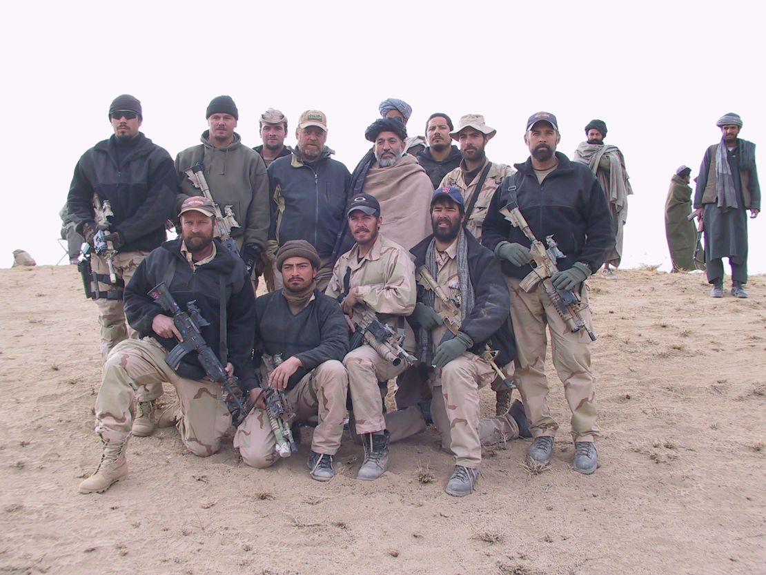 Amerine and his Special Forces teammates with future Afghan President Hamid Karzai in Afghanistan on December 3, 2001. 