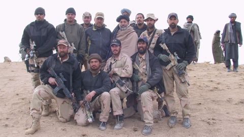 Amerine and his Special Forces teammates with future Afghan President Hamid Karzai in Afghanistan on December 3, 2001. 
