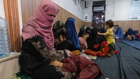 Displaced Afghan women and children from Kunduz shelter at a mosque in Kabul on August 13.
