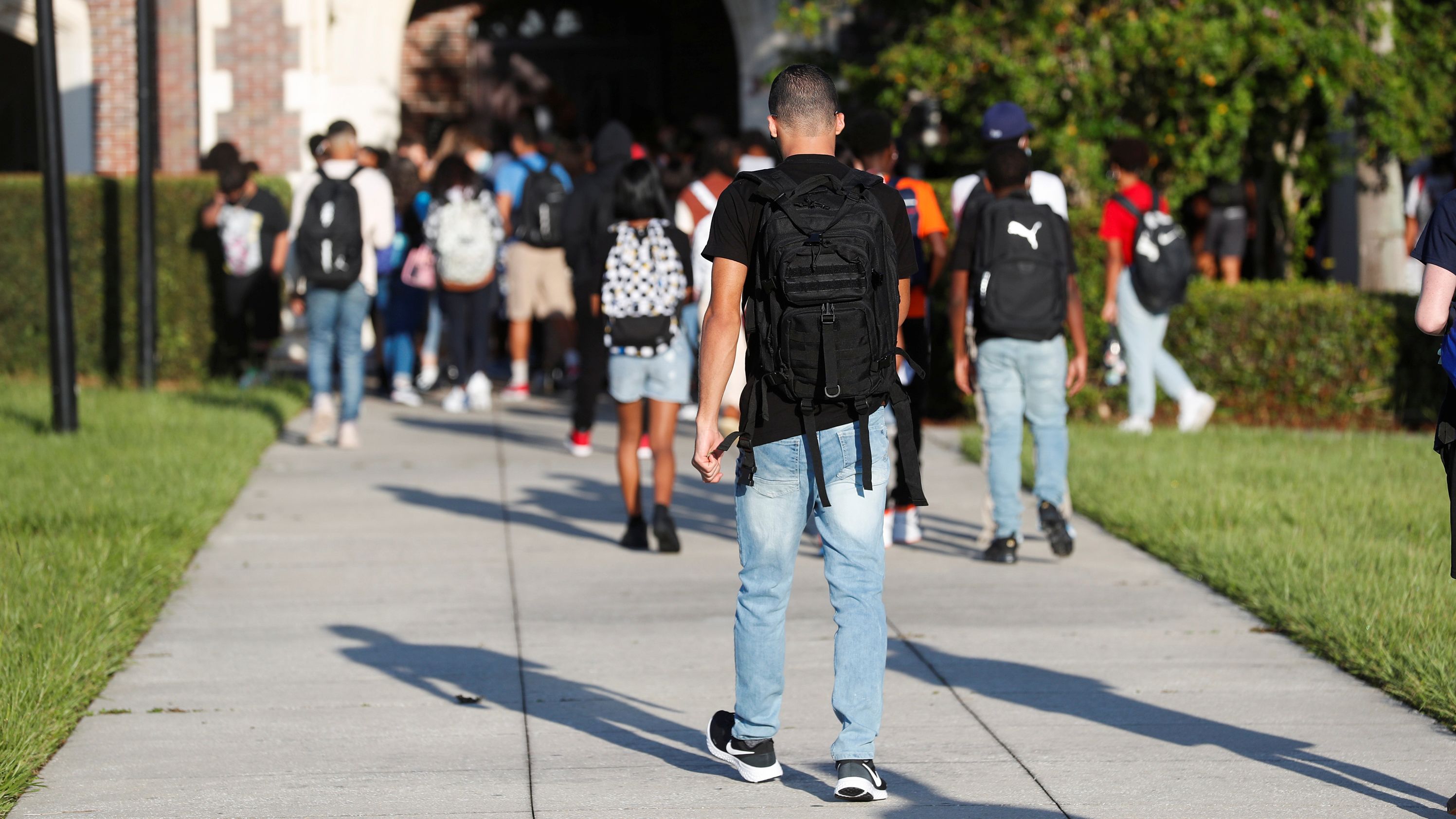 Students return on the first day of school at Hillsborough High School in Tampa, Florida, on August 10, 2021.