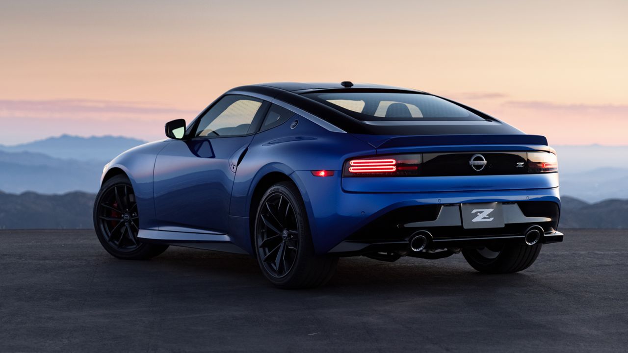 The tail of the Nissan Z slopes downward and flared rear fenders give it a wide look.