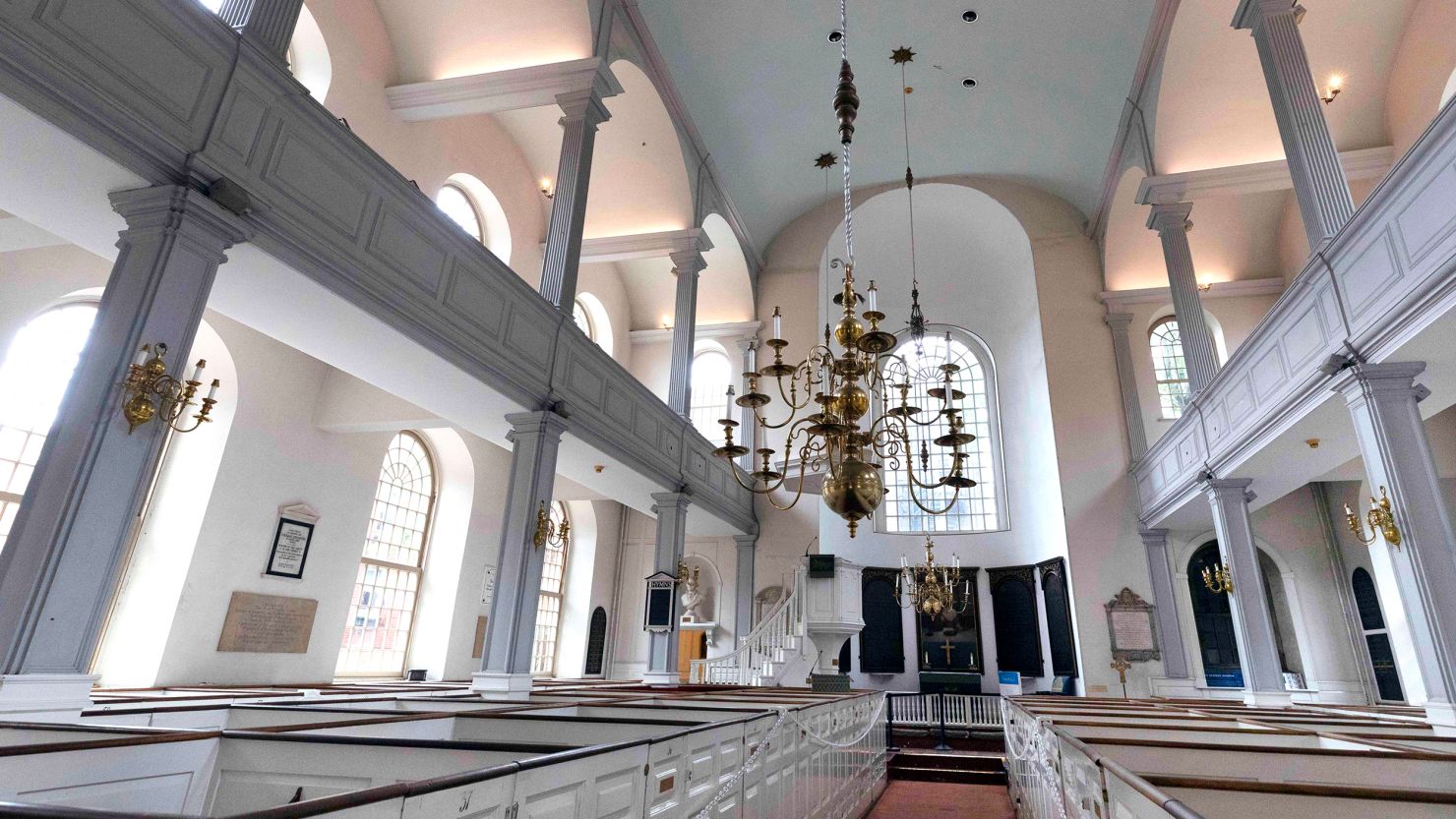 The interior of the historic Old North Church. It's famous as the place where in 1775 two lanterns in the steeple signaled that the British were heading to Concord and Lexington, but it's not well known that some of the church's early congregants were slaveholders. 