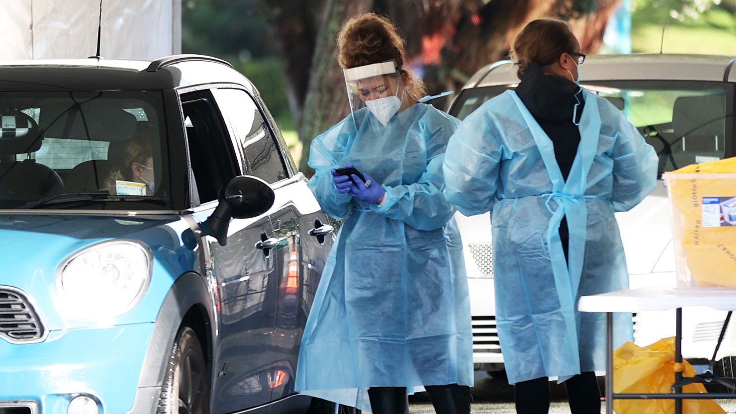 People are tested at a pop up Covid-19 testing station in Auckland, New Zealand, on August 18, 2021.