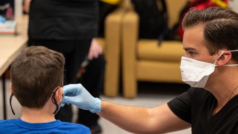  An unidentified student is administered a test by a Wild Health nurse during a COVID-19 testing day at Brandeis Elementary School on August 17, 2021 in Louisville, Kentucky. 