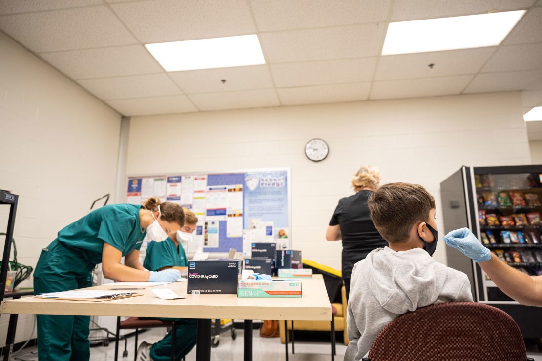 A student is administered a test during a Covid-19 testing day at Brandeis Elementary School on August 17, 2021, in Louisville, Kentucky.