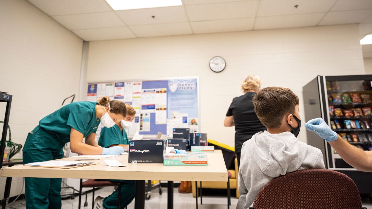 A student is administered a test during a Covid-19 testing day at Brandeis Elementary School on August 17, 2021, in Louisville, Kentucky.
