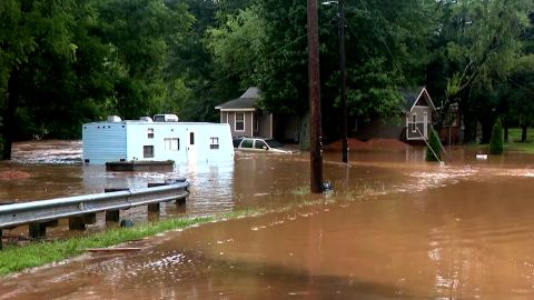 Crews rescue stranded drivers in Haywood County, North Carolina, after flooding.