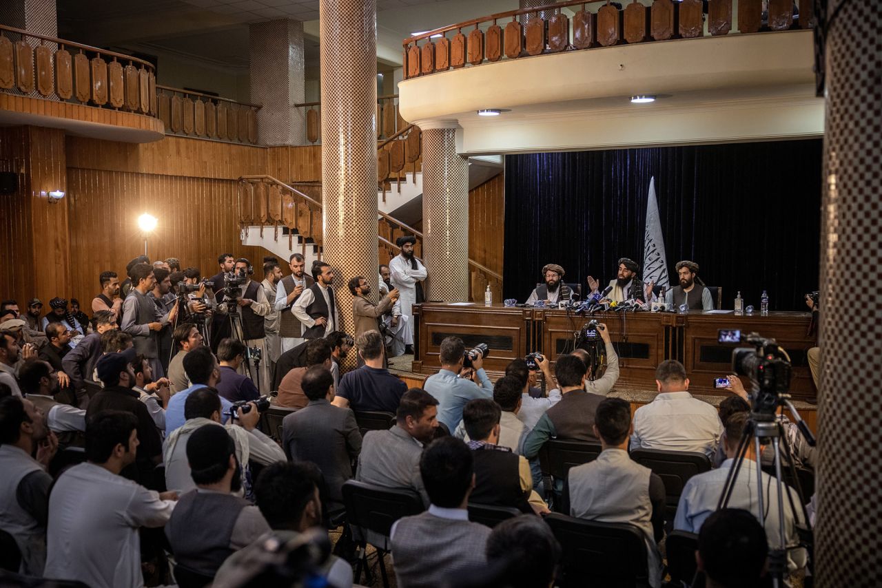 Taliban spokesman Zabihullah Mujahid addresses reporters in Kabul on August 17. "We don't want Afghanistan to be a battlefield," he said. "Today the fighting is over. ... Whoever was against the opposition has been given blanket amnesty." Those promises have been met with <a href="https://www.cnn.com/2021/08/17/asia/afghanistan-taliban-withdrawal-tuesday-intl/index.html" target="_blank">skepticism by the international community.</a> It was <a href="https://www.cnn.com/2021/08/17/asia/afghanistan-taliban-withdrawal-tuesday-intl/index.html" target="_blank">the Taliban's first news conference</a> since they took control of Kabul.