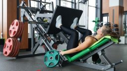 NOVOSIBIRSK, RUSSIA - AUGUST 26, 2020: A woman does exercises on a leg press machine at an X-Fit gym reopened after the lifting of COVID-19 restrictions. Kirill Kukhmar/TASS (Photo by Kirill Kukhmar\TASS via Getty Images)