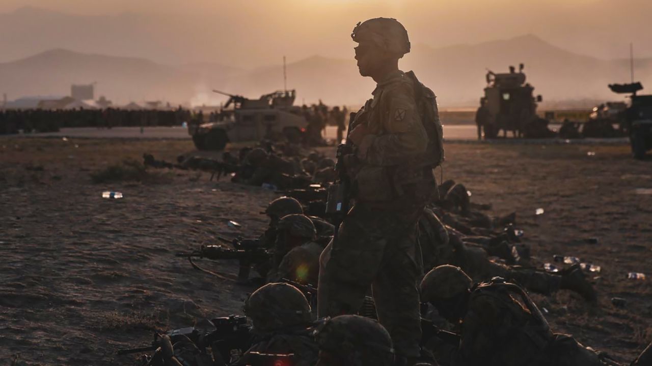 U.S. Army Soldiers assigned to the 10th Mountain Division stand security at Hamid Karzai International Airport, Kabul, Afghanistan, August 15.