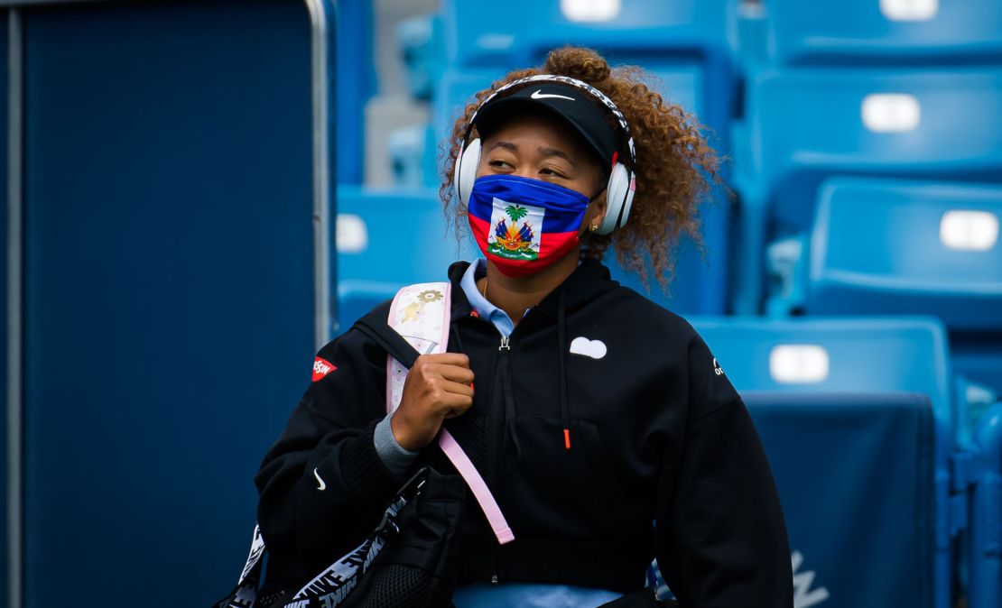 Naomi Osaka wears a Haiti face mask ahead of her second round match at the Western & Southern Open.