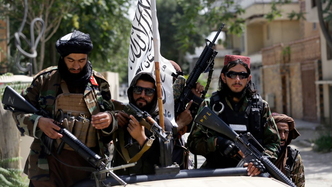 Taliban fighters patrol Kabul on Thursday, Afghanistan's Independence Day.