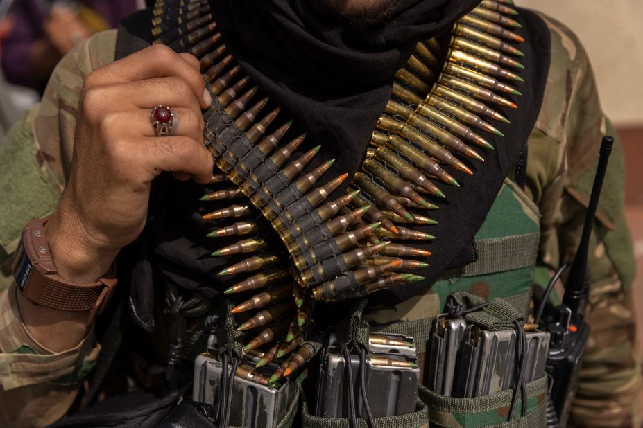 A heavily armed Taliban fighter guards the Afghanistan central bank in Kabul on August 19.