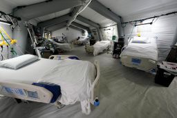 Five intensive care beds, part of the 32-bed Samaritan's Purse Emergency Field Hospital, are set up in a parking garage in Jackson, Miss. 