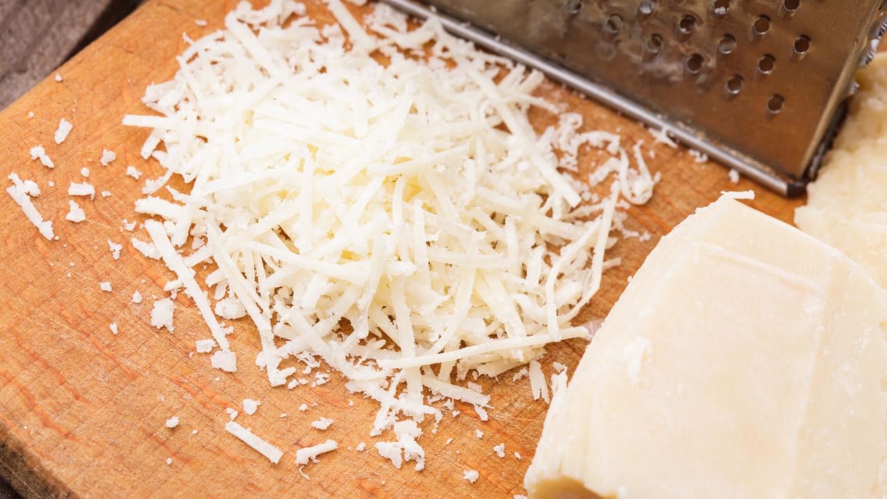 Time for the toppings -- how about grated Parmesan cheese?