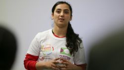 Former Afghanistan women's football captain Khalida Popal speaks during a motivational session with young women in south London on March 30, 2018.
Former Afghanistan women's football captain Khalida Popal fled her country after receiving death threats but it has far from cowed her in fighting the prejudice which confronts women daily, she told AFP. The 30-year-old -- who has been based in Denmark since 2011 -- takes her message round the world and spoke after giving an inspirational talk to the girls of Team England who will compete in the Street Child World Cup in Moscow later this year. Popal said women could achieve anything, a belief she formed when as a child a group of men refused to give back the football she was playing with, saying girls had no right to take part in sport. / AFP PHOTO / Daniel LEAL-OLIVAS        (Photo credit should read DANIEL LEAL-OLIVAS/AFP via Getty Images)