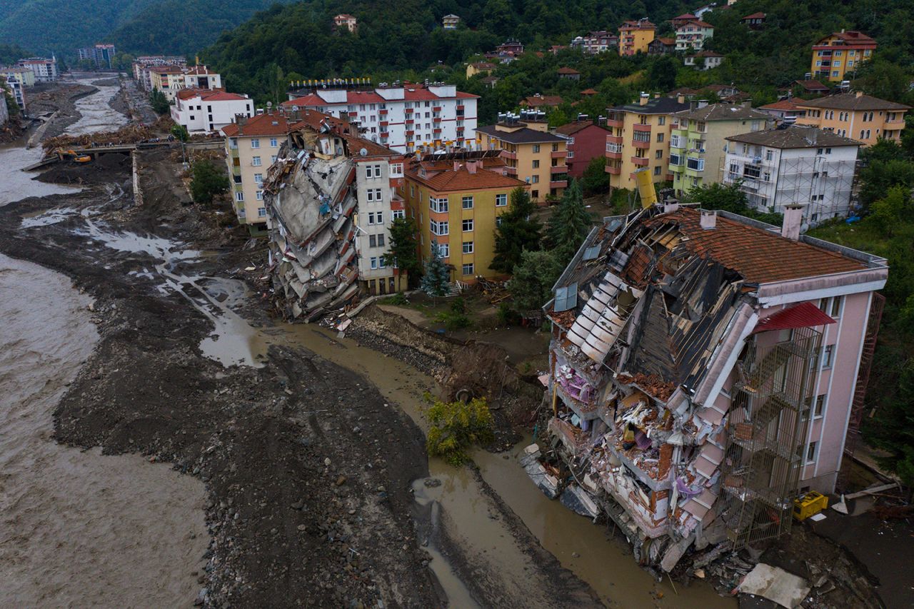 Damaged buildings are seen in Bozkurt, Turkey, on Saturday, August 14, after there were deadly flash floods along the country's Black Sea coast. More than 2,000 people evacuated the flood zones.