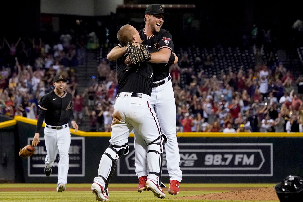 Arizona pitcher Tyler Gilbert, right, celebrates with catcher Daulton Varsho after <a href="https://www.cnn.com/2021/08/14/sport/no-hitter-mlb-tyler-gilbert-first-start-spt/index.html" target="_blank">throwing a no-hitter in his first Major League start</a> on Saturday, August 14. Gilbert is only the fourth pitcher in league history to throw a no-hitter in his first start, and he is the first to do so since 1953, according to MLB.com.