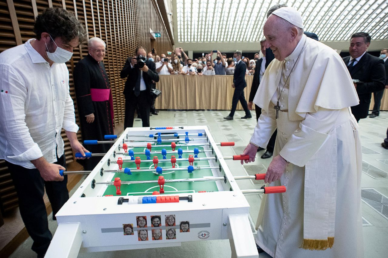 Pope Francis plays table football, aka foosball, during his weekly general audience at the Vatican on Wednesday, August 18. The table was gifted to him by Sport Toscana Calcio Balilla, a table football association based in Altopascio, Italy.