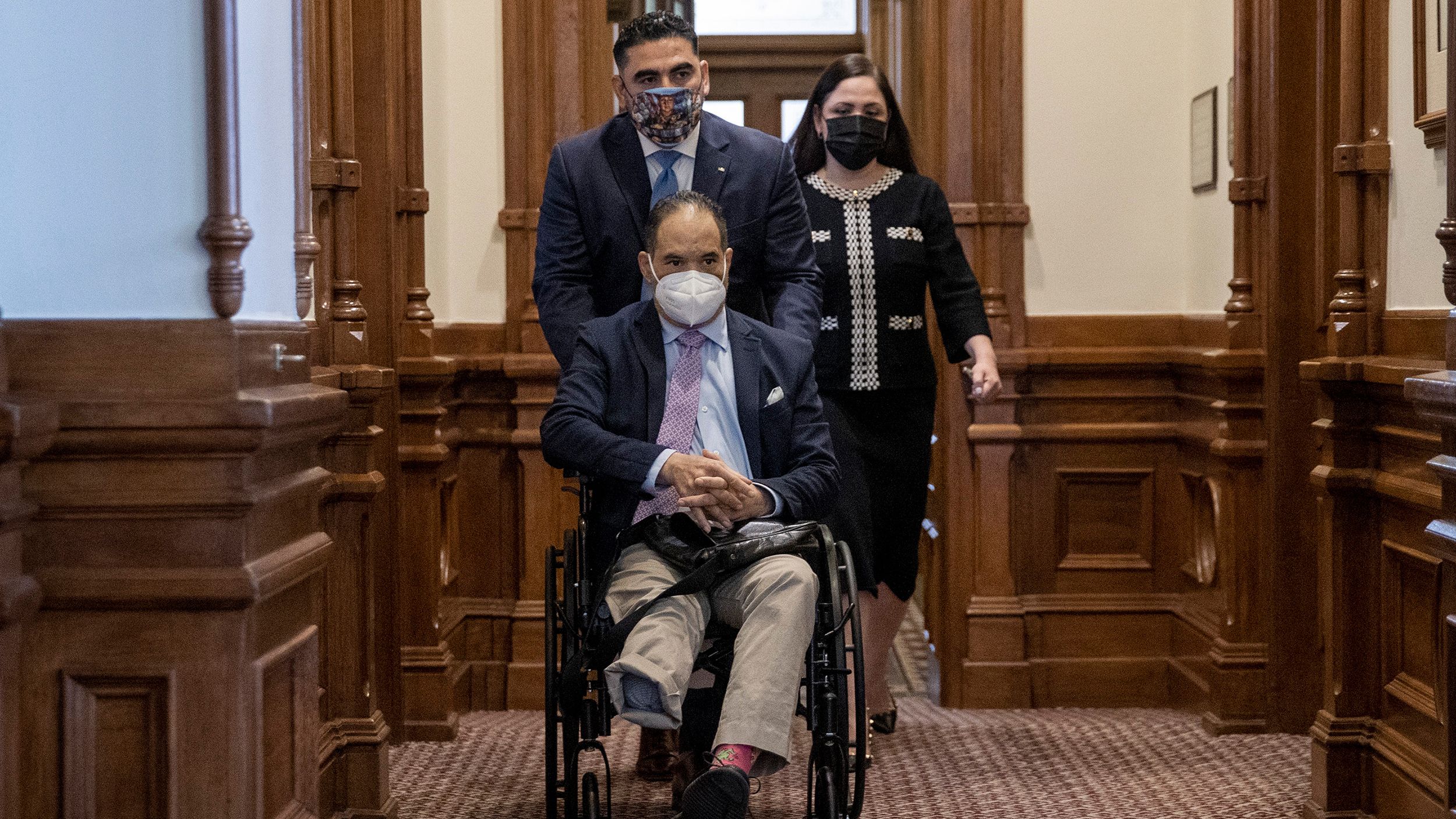State Rep. Armando Walle, D-Houston, left to right, Rep. Garnet F. Coleman, D-Houston, and Rep. Ana Hernandez, D-Houston, enter the House Chamber at the Capitol in Austin, Texas, on Thursday August 19, 2021.