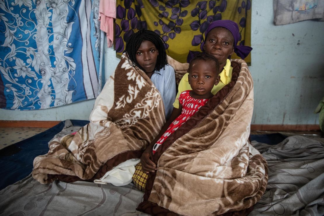 Residents of the Praia Nova neighborhood in Beira, Mozambique take shelter from tropical cyclone Eloise. 