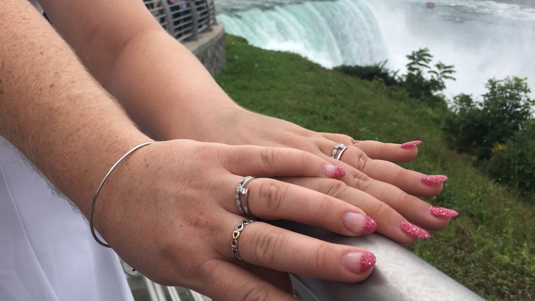 <strong>Wedding bands:</strong> The couple had decided to marry without rings, but Kyrie surprised Natasha with new ones during their wedding ceremony. "It was such a perfect moment," says Kyrie.