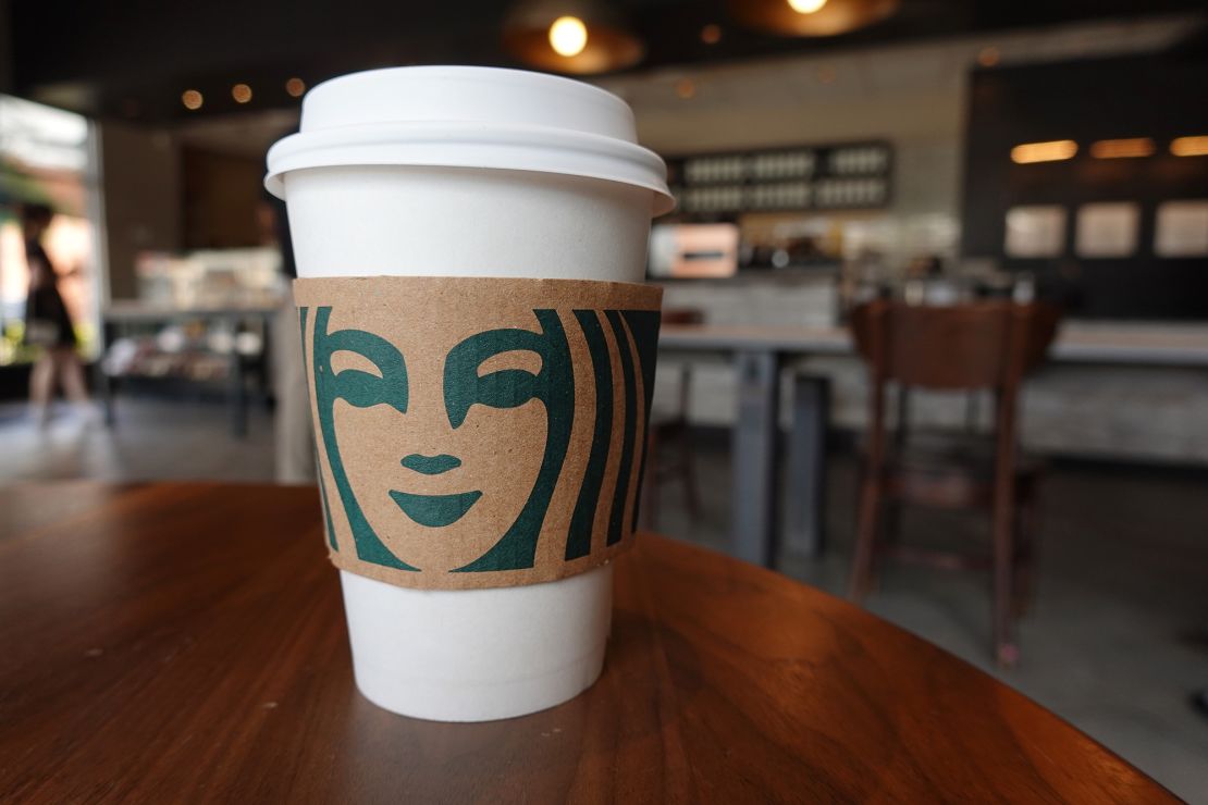 The traditional Starbucks disposable cup.