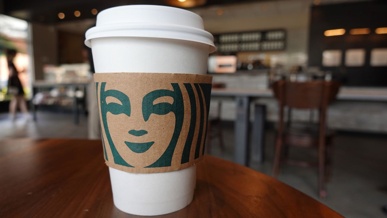 The traditional Starbucks disposable cup.