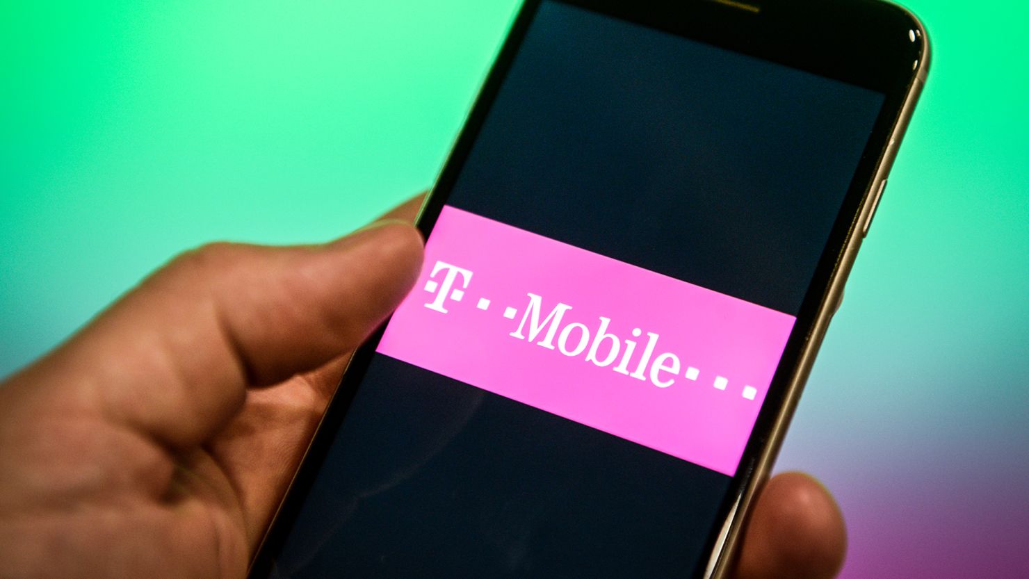 A T-Mobile logo is seen on a smartphone screen in this photo illustration on July 5, 2018.