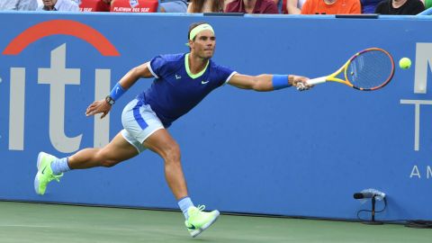 Nadal tries to return a shot during his match against Lloyd Harris at the Citi Open.