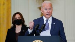 President Joe Biden speaks about the evacuation of American citizens, their families, SIV applicants and vulnerable Afghans in the East Room of the White House, Friday, Aug. 20, 2021, in Washington. Vice President Kamala Harris listens at left. (AP Photo/Manuel Balce Ceneta)