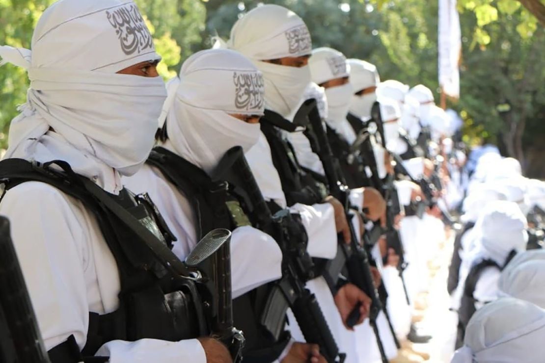 The Taliban have published a series of photographs of their fighters at an Independence Day parade brandishing US assault weapons. 