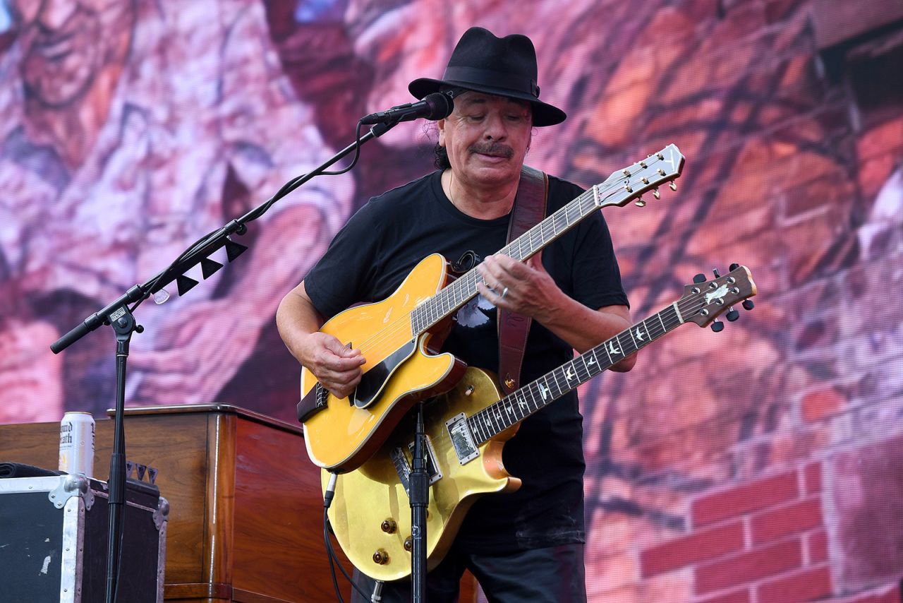 Guitar legend Carlos Santana performs "Maria Maria." Wyclef Jean joined Santana for the performance. 