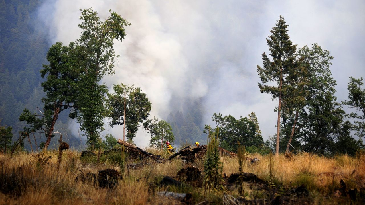 The Caldor Fire burns across the Camp Creek in El Dorado National Forest in California on August 20.