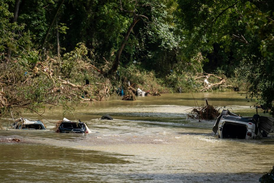 Vehicles are submerged in Trace Creek as a result of the severe weather in Waverly.