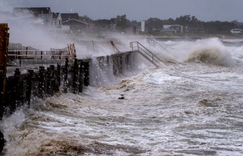 Waves pound a seawall in Montauk, New York, on August 22.