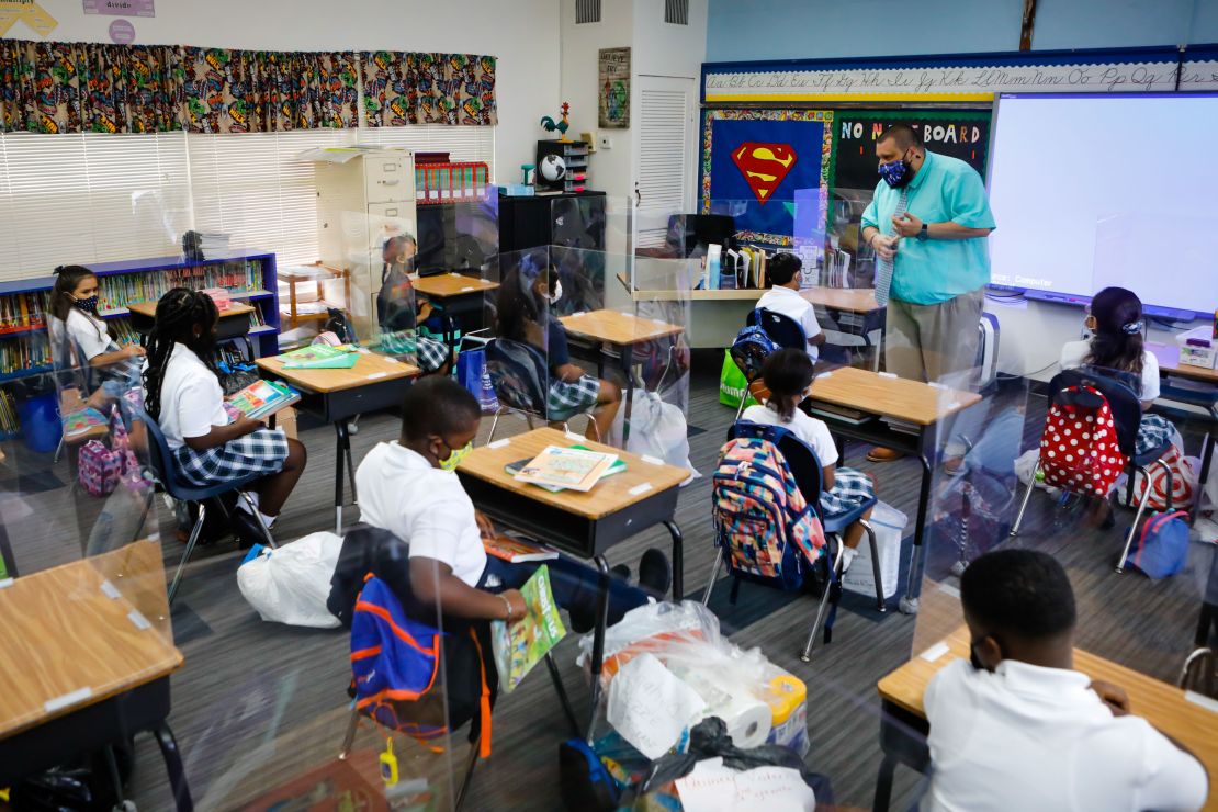 Students inside a classroom during the first day of classes at a private school in North Miami Beach on Wednesday, August 18.