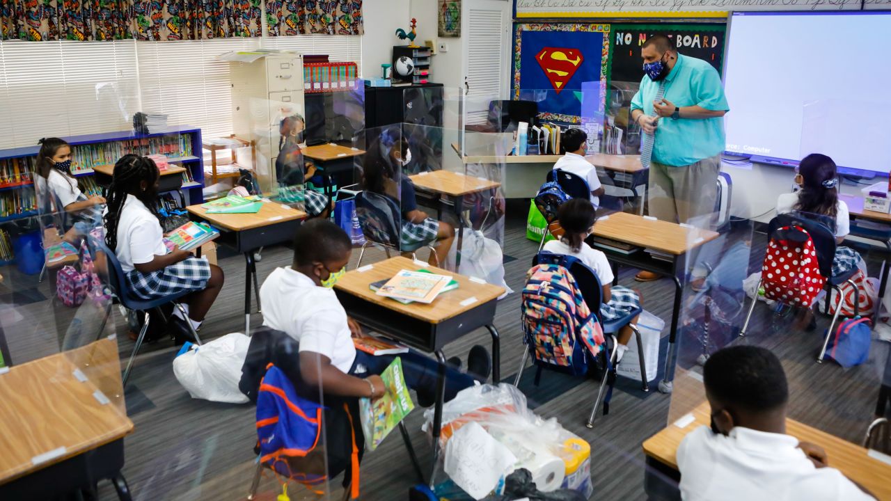 Students inside a classroom during the first day of classes at a private school in North Miami Beach on Wednesday,  August 18.