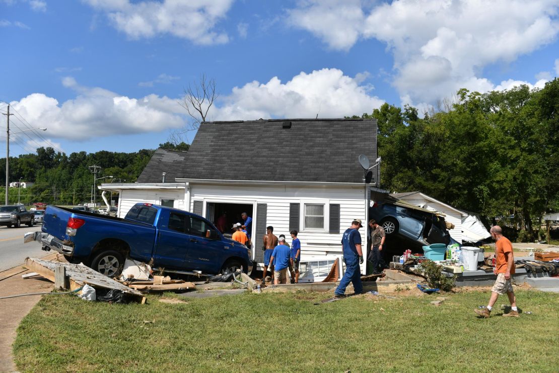 A damaged house is seen Sunday in Waverly, Tennessee.