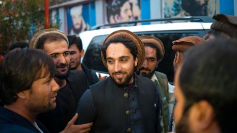 Ahmad Massoud, center, speaks with a young Afghan on the street on September 15, 2019, in Kabul, Afghanistan. 