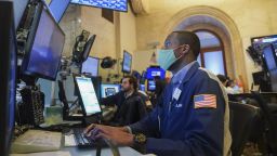 Traders work at the trading floor in the New York Stock Exchange in New York, the United States, Aug 19, 2021.