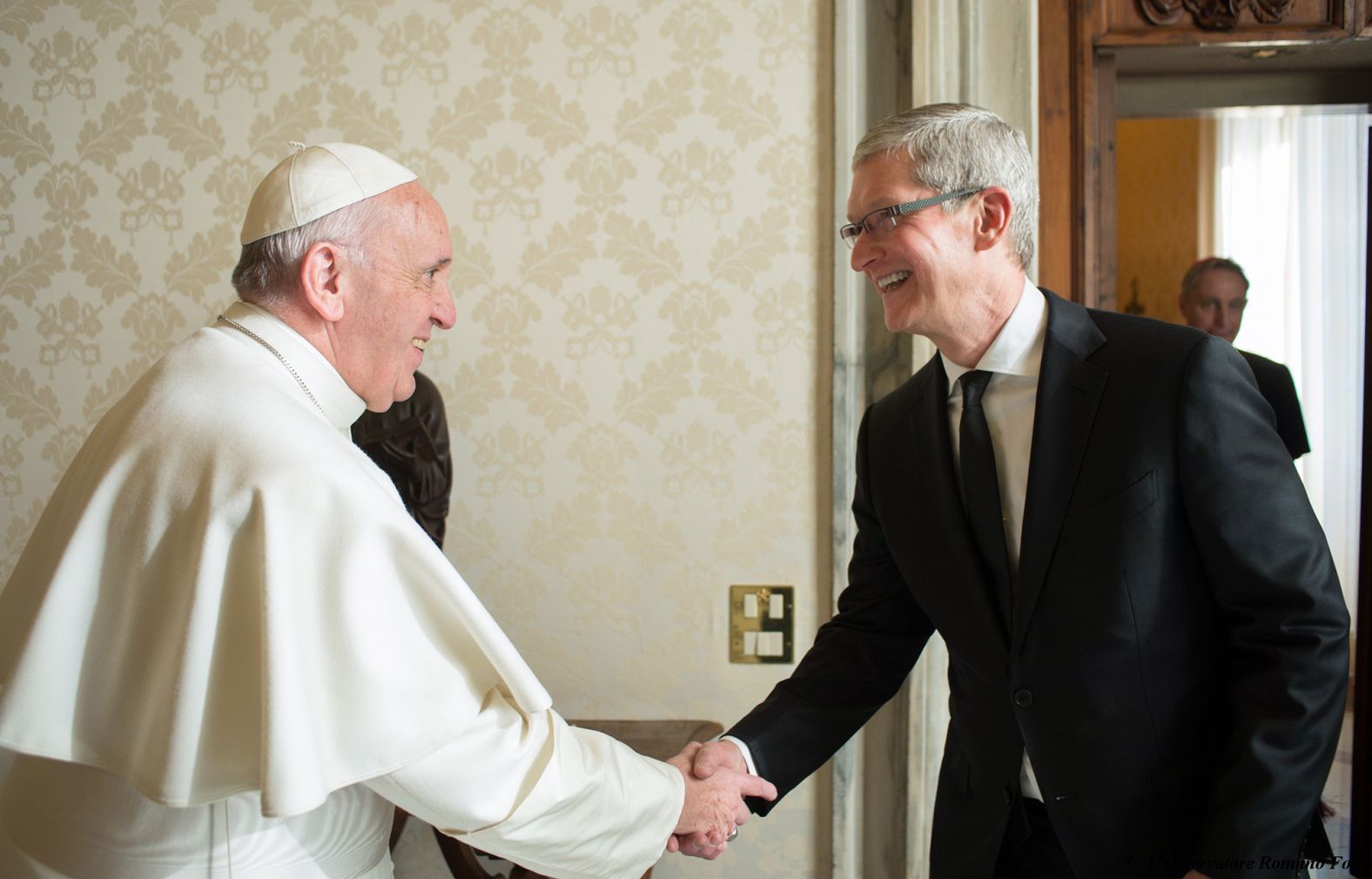 Cook is greeted by Pope Francis at the Vatican in January 2016.